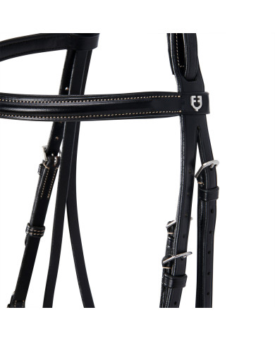 Testiera inglese in cuoio con ricami Testiera inglese in cuoio con ricami